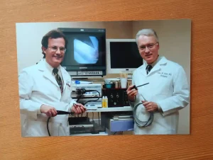 Dr. Robert Bastian and Dr. Brent Richardson in October 2003